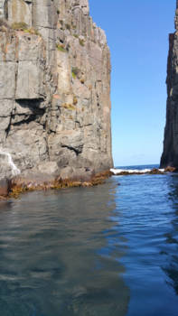 Tasmanië - Hoge bergwanden en geweldig weer om te varen